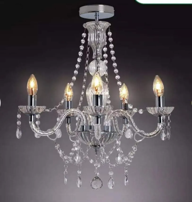 Crystal chandelier with candle-style bulbs